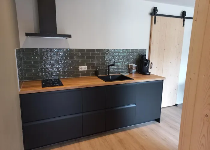 Klein Koestapel بوتِنْ